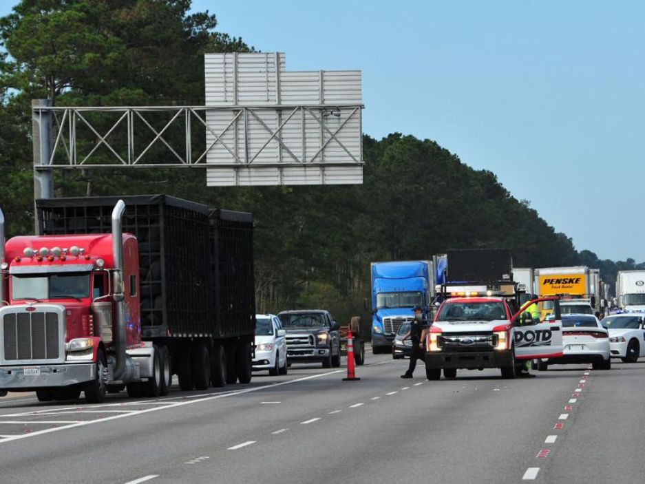 CBRNe - Tanker hauling hazmat crashes into police car, catches fire on I-12; 2 injured 